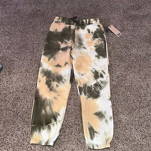 Sage green and peach tie dye sweatpants.